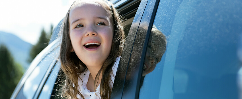 a kid in a car