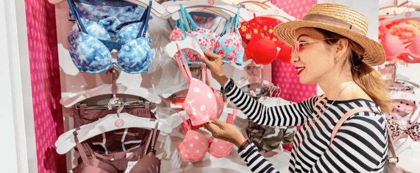 woman shopping for underwear at the victoria's secret store