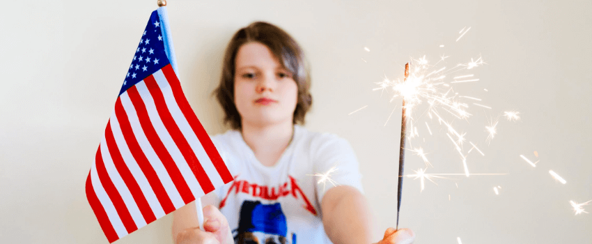 kid celebrating 4th of july